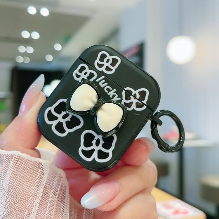 Custodia protettiva per auricolari Bluetooth AirPods 2/1 con motivo colorato 3D (Fiocco nero) - Immagine 1
