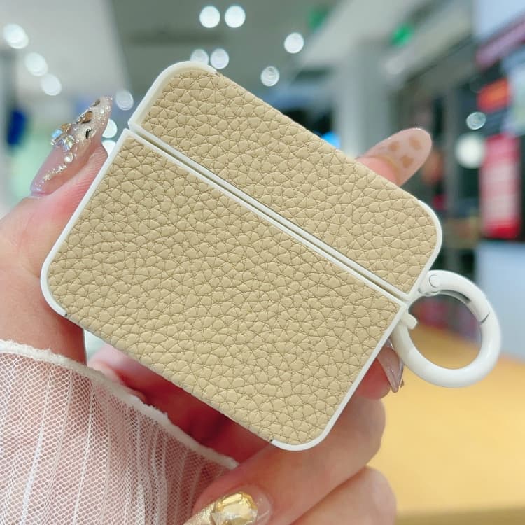 Custodia protettiva in pelle con texture litchi per auricolari AirPods 4 (albicocca) - Immagine 1