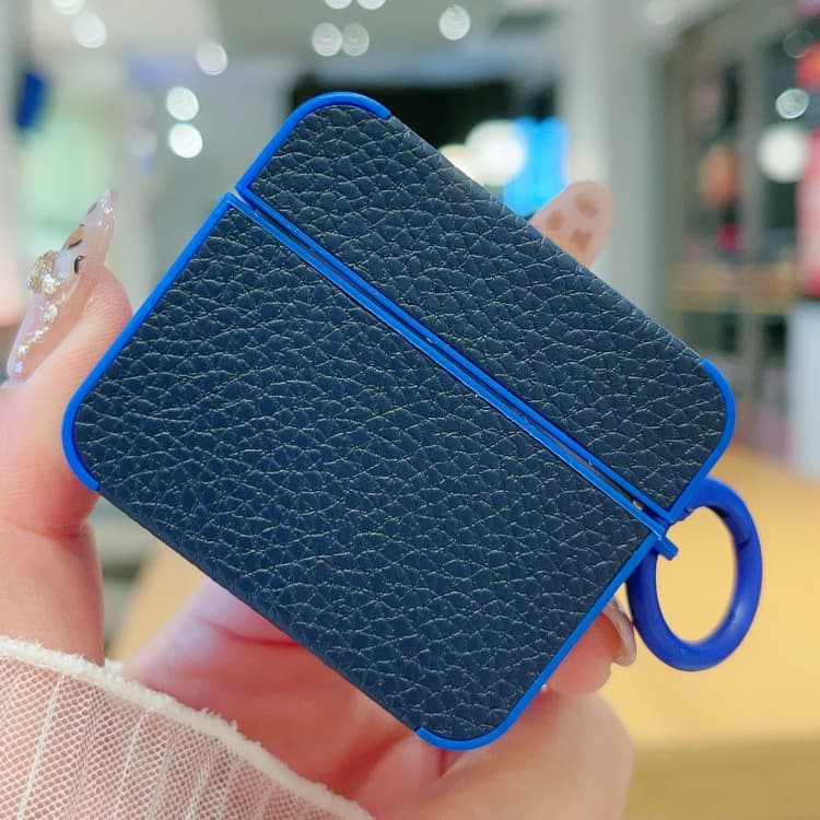 Custodia protettiva in pelle con texture litchi per auricolari AirPods 4 (Blu scuro) - Immagine 1