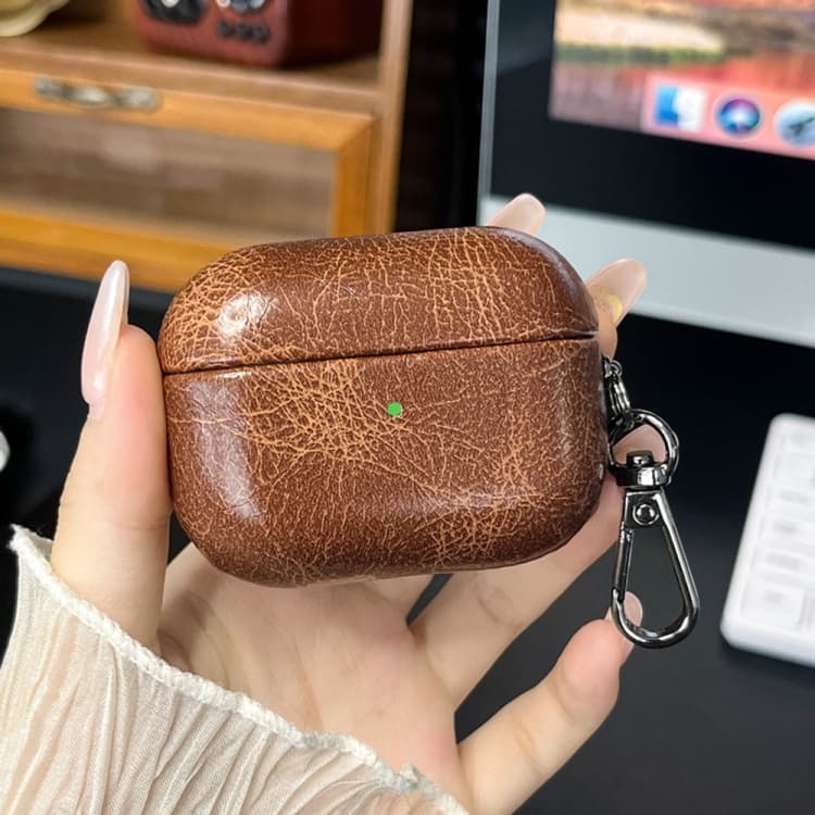Custodia protettiva in pelle retrò per auricolari Bluetooth AirPods 4 (Caffè) - Immagine 1