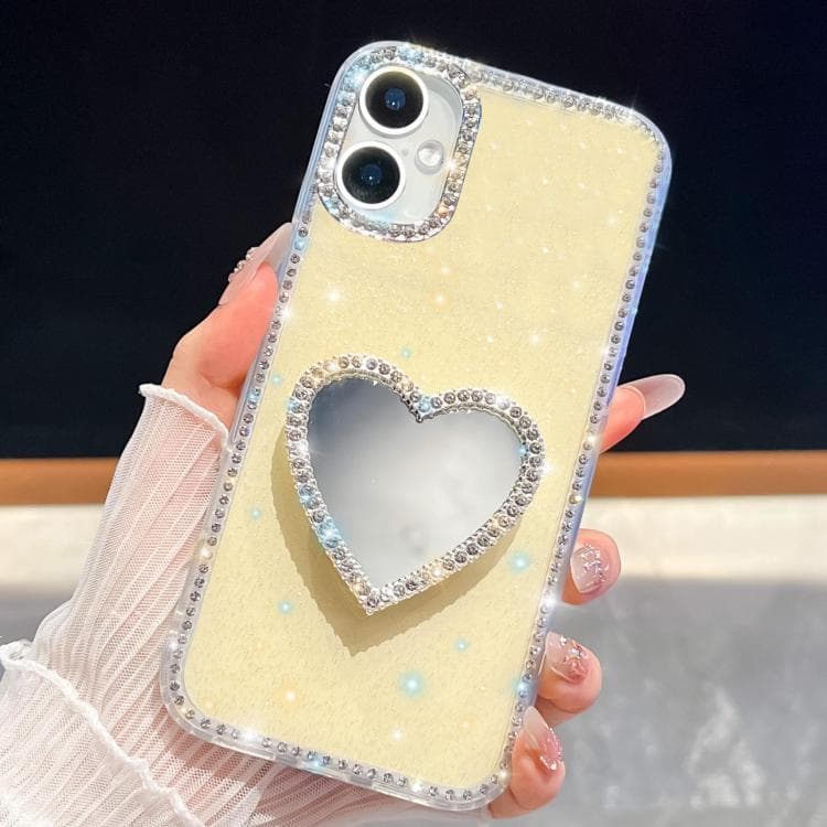 For iPhone 16 Diamond Glitter Mirror Heart Holder Phone Case(Light Yellow) - Immagine 1