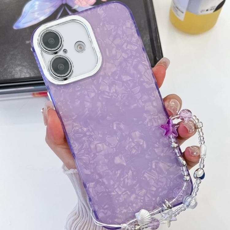 For iPhone 16 Plating Glitter Texture Chain Wristband TPU Phone Case with Lens Film(Purple Shell Pattern) - Immagine 1