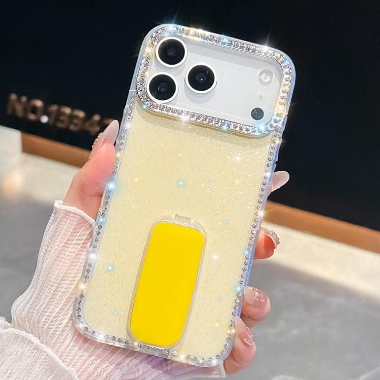 For iPhone 17 Pro Rhinestone Glitter TPU 4-corners Anti-fall Phone Case with Holder(Light Yellow) - Immagine 1