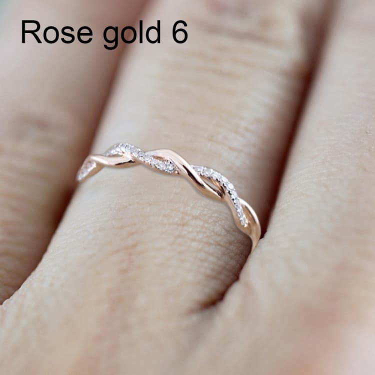 Anello classico donna a forma di torsione con zirconio cubico, colore: oro rosa (6) - Immagine 1