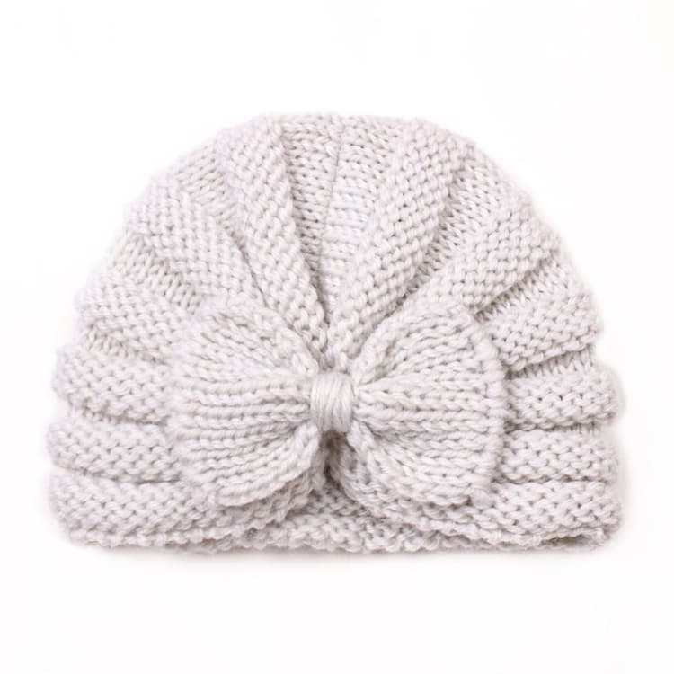 Cappello lavorato a maglia con fiocco per bambini autunno e inverno, berretto di lana riscaldante (Beige) - Immagine 1